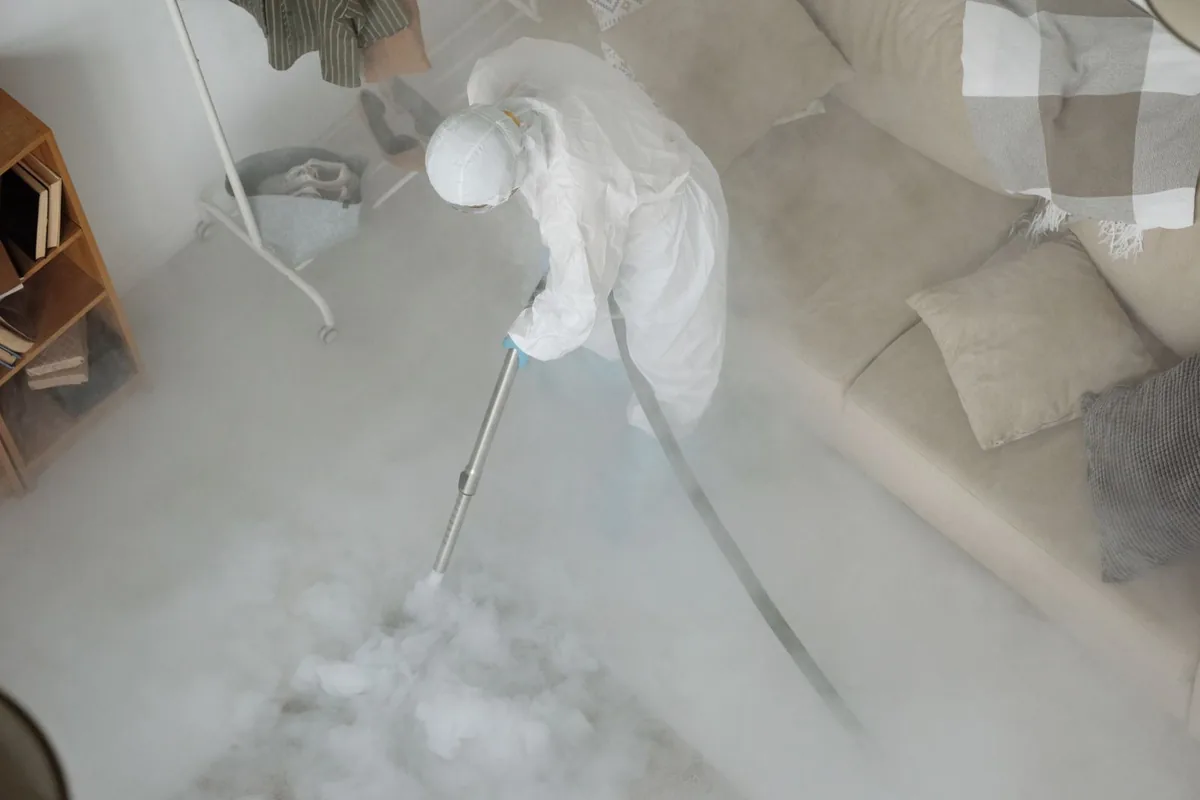 Biohazard cleanup technician in protective equipment, Paradise, NV
